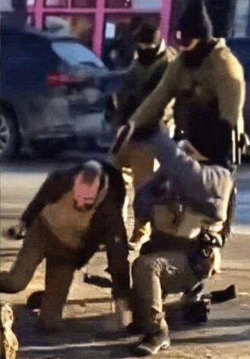 Photo of border patrol officer moments before he executed nurse Alex Pretti